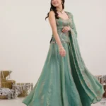 Mira teal green fendi silk lehenga